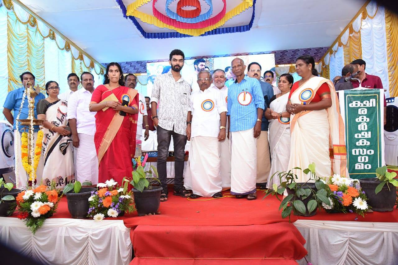 artist with kerala minister